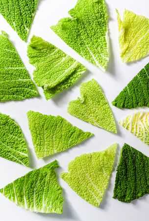 background of cabbage leaves. the pattern of healthy cuisine. harvest of green vegetables. texture of organic products. concept of biologically pure production. the idea of dietary nutritionの写真素材