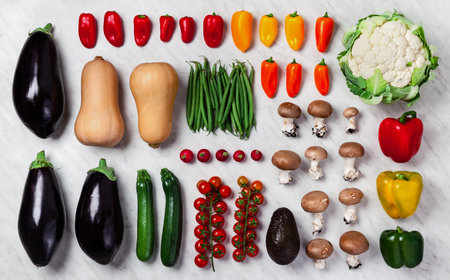 a variety of fresh Vegetables background on a white marble table. place for writing text copy ...
