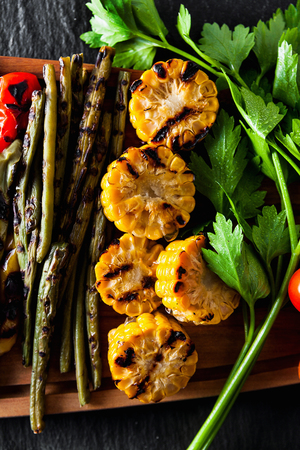 healthy summer food. a wide variety of sliced Grilled Veggies. The perfect garnish for a big bbq party or a celebration , weekend の写真素材