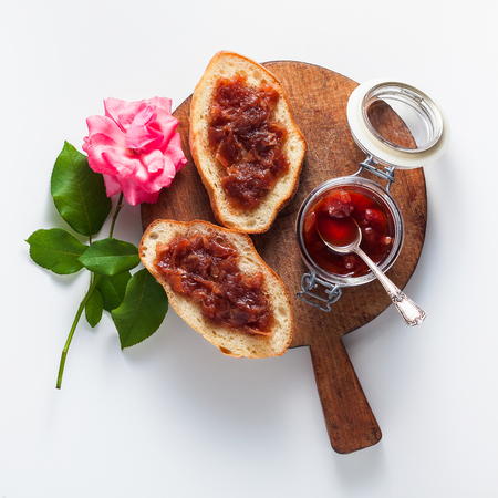 freshly made homemade jam from roses. summer conservation. isolated on whiteの写真素材