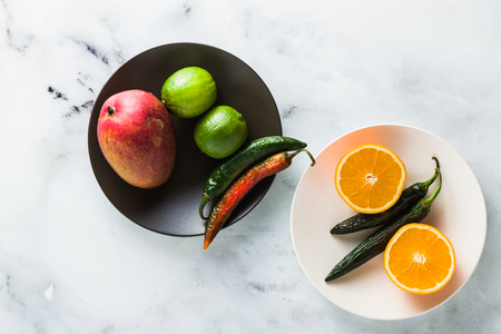 colored vegetables and fruits on the table. preparation of morning juices. healthy eatingの写真素材
