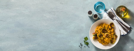 banner of risotto with pumpkin and brussels sprouts on the table. A healthy recipe for the whole family. festive table. copy spaceの写真素材