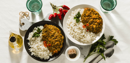 banner of Basmati rice with curry from vegetables and lentils. Healthy spicy vegan food.の写真素材