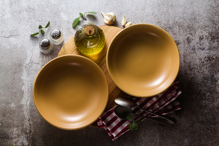 empty plates on the table, table setting for dinner or lunch. stylish kitchenwareの写真素材