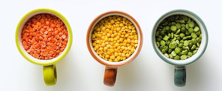 banner of lentils of different types and colors in portioned cups. vegan proteins.の写真素材