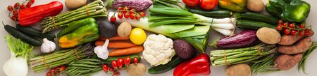banner of many varied colored fresh vegetables for home delivery. advertisingの写真素材