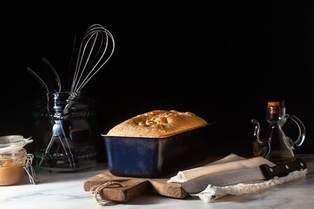 Fresh homemade Toast bread on the kitchen table, dark background.の写真素材