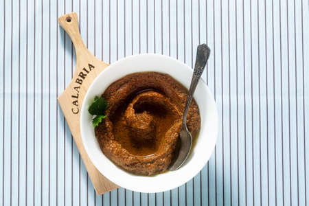 sun-dried tomato and walnut appetizer in a bowl. recipe of the southern region of Italy - Calabriaの写真素材