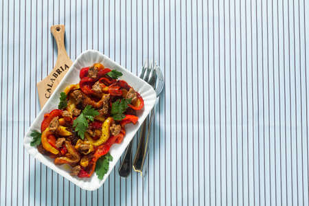 Calabrian summer baked peppers appetizer with sun-dried tomato and nut sauce. Vegan Health Foodの写真素材