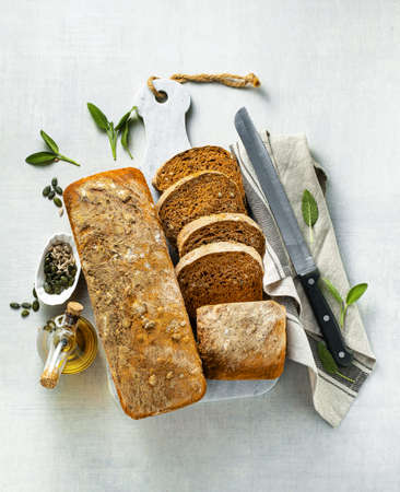 tomato bread with seeds and sun-dried tomatoes, a healthy morning breakfast or snackの写真素材