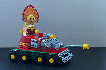russian nesting doll on a toy tank
