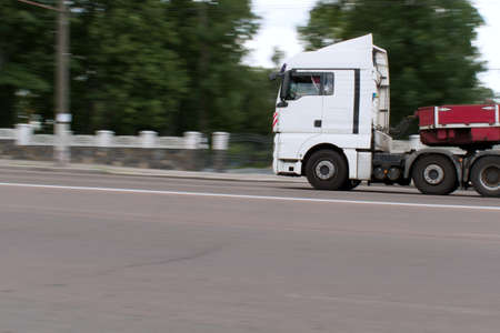 city traffic motion blurred truck in motionの写真素材