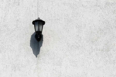 street lamp lighting on white painted wallの写真素材