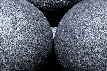 sparkling round boulders in symmetrical geometry and black and white representation