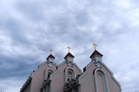 cathedral towers on cloudy sky backgroundの写真素材