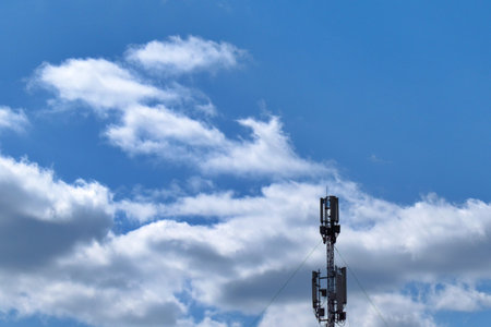 telecommunication equipment antennas on blue sky backgroundの写真素材