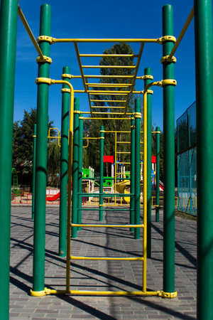 metal outdoor sports equipment in yellow and green color