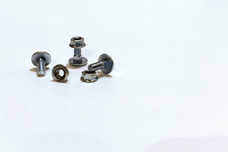 metal screws for threaded fasteners and connections of various parts on white background