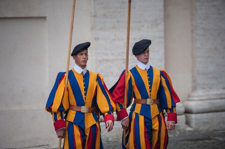 Famous Swiss Guard surveil basilica entrance, Vaticanのeditorial素材
