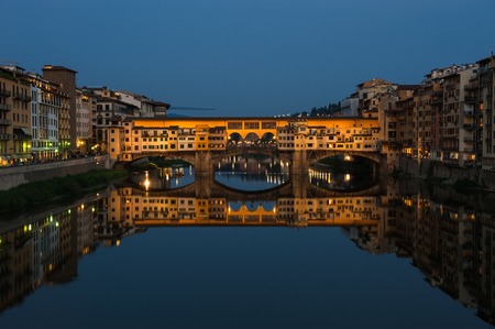 Ponte Vecchio bridge in Florence at nightの写真素材