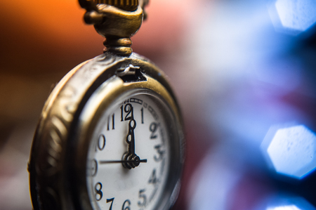 New year clock on abstract color backgroundの写真素材