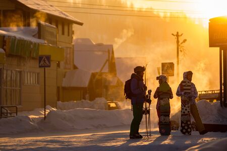 SHEREGESH, RUSSIA - DECEMBER 4, 2018: Skiers and snowboarders stand in the cold at -29 degrees Celsius.のeditorial素材