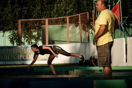 MOSCOW, RUSSIA - JUNE 24, 2019: Russian athlete Daria Sizova rolls the ball for bocce raffa on tournament Sozidanie.のeditorial素材