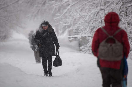 GUDAURI, GEORGIA - FEBRARY 4, 2013: The inhabitants of Moscow fell under heavy snow.のeditorial素材