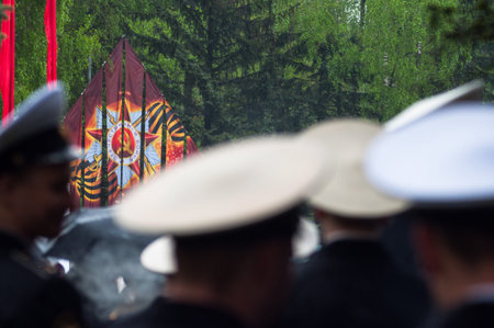 OBNINSK, RUSSIA - MAY 9, 2012: Soldiers are drenched in the rain on Victory Day.