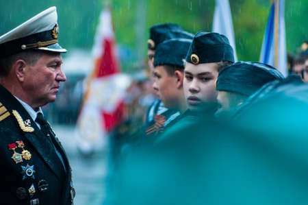 OBNINSK, RUSSIA - MAY 9, 2012: Soldiers are drenched in the rain on Victory Day.のeditorial素材