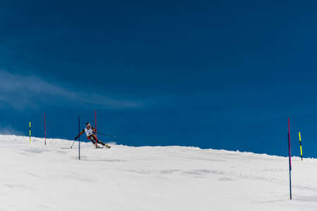 GUDAURI, GEORGIA - MARCH 28, 2015: Georgian skier performs at slalom champion of Georgia.のeditorial素材