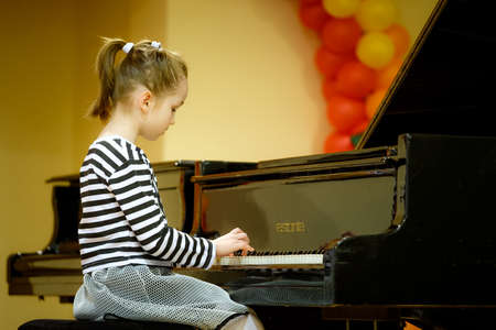 OBNINSK, RUSSIA - MARCH 8, 2018: Celebratory concert in children's music school number 1.のeditorial素材
