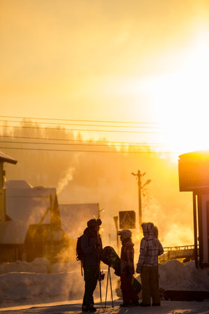 SHEREGESH, RUSSIA - DECEMBER 4, 2018: Skiers and snowboarders stand in the cold at -29 degrees Celsius.のeditorial素材