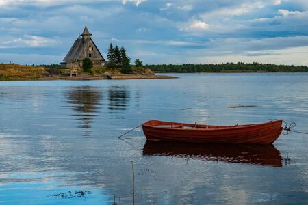 Old russian Orthodox wooden church in the village Rabocheostrovsk, Karelia.の写真素材