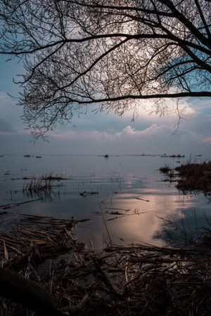 Sunset on Lake Nero during a flood.