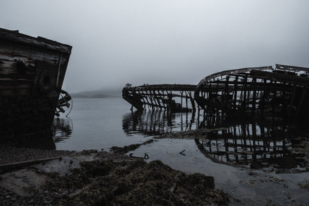 Ship cemetery in the Murmansk region in the village of Teriberka on the shore of the Barents Seaの写真素材