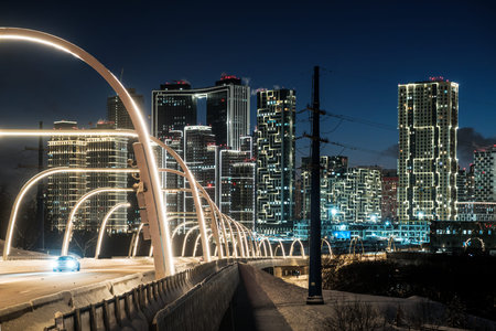 Evening view of the bridge and residential buildings on Mosfilmovskaya Street in Moscow