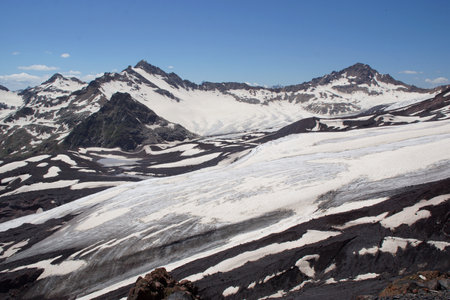 Beautiful snow-capped mountain peaks of the Caucasus Mountains next to the highest peak in Europe - Elbrusの写真素材