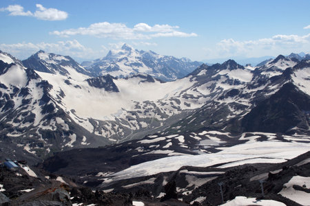 Beautiful snow-capped mountain peaks of the Caucasus Mountains next to the highest peak in Europe - Elbrusの写真素材