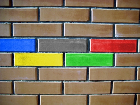 The horizontal walls of brick tiles  Five tiles are decorated with colors of the sports competition ringsのeditorial素材