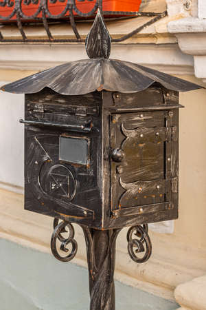 GRODNO, BELARUS - July 2021 A decorative wrought-iron letterbox stands at the post office.のeditorial素材
