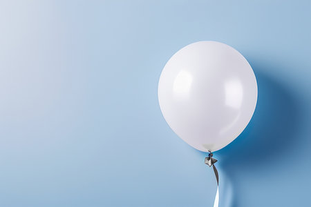 One white transparent balloon on a light blue background. Holiday concept. Illustration with place for text for design, cards, invitations. Minimalistic styleの素材