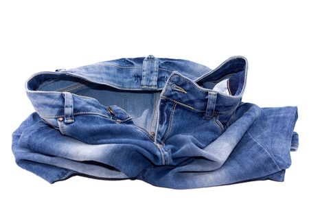 Remove your jeans - blue jeans in a heap on the floor.の写真素材