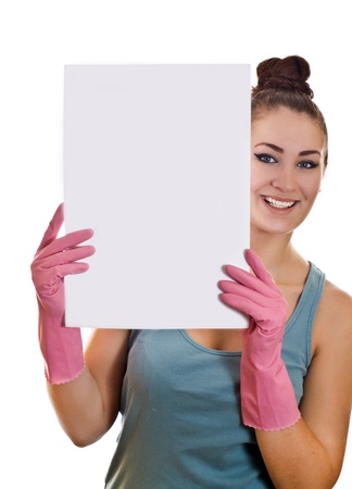 Cleaning woman showing a white paper on the white backgroundの写真素材
