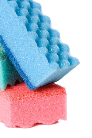 Blue, pink and blue kitchen sponges, isolated on a white background.の写真素材