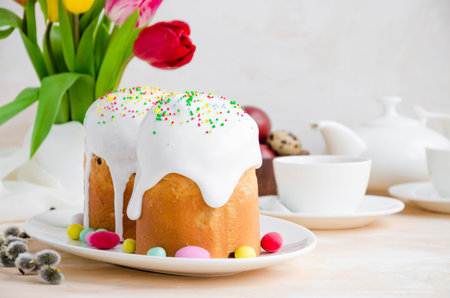 Easter composition. Easter Cake - Russian and Ukrainian Traditional Kulich with easter eggs on a...