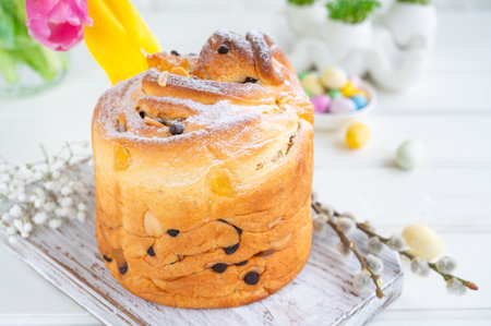 Easter composition. Traditional Ukrainian Easter cake - Cruffin, Kraffin or Kulich with chocolate...