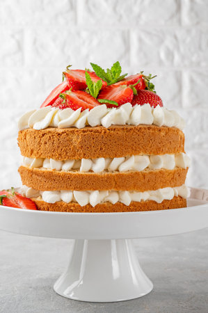 Strawberry cake, vanilla sponge cake with cream cheese and fresh strawberries. summer cake....