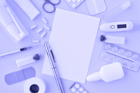 Very pery the color of the year 2022. Top view of medical instruments: syringe, vaccine, pills,...