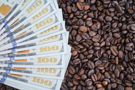 The 100 dollar bills are on roasted coffee beans. The concept of rising food prices, the global food...